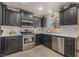 Beautiful kitchen featuring stainless steel appliances and ample cabinet space at 4938 Via Luis Ct, North Las Vegas, NV 89031
