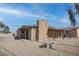 Charming home featuring a stone chimney and rock landscaping at 501 National St, Henderson, NV 89015
