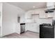 Bright kitchen with stainless steel dishwasher and ample countertop space at 501 National St, Henderson, NV 89015