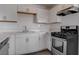 Bright kitchen with stainless steel appliances, granite countertops, and modern cabinetry at 501 National St, Henderson, NV 89015