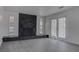 Bright living room with fireplace and lots of natural light from the French doors at 501 National St, Henderson, NV 89015