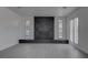 Bright living room with fireplace and lots of natural light from the French doors at 501 National St, Henderson, NV 89015