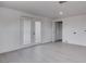 Neutral colored living room with double doors and neutral paint at 501 National St, Henderson, NV 89015