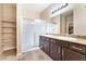 Bathroom featuring a double vanity with granite countertops at 5648 Alitak Bay St, North Las Vegas, NV 89081