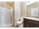 Bathroom featuring a shower and vanity with granite countertop at 5648 Alitak Bay St, North Las Vegas, NV 89081