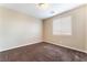 Cozy bedroom with neutral walls, carpet and a window providing natural light at 5648 Alitak Bay St, North Las Vegas, NV 89081