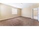 Cozy bedroom with plush carpet and large window at 5648 Alitak Bay St, North Las Vegas, NV 89081