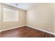 Bedroom featuring wood floors and a window providing natural light at 5648 Alitak Bay St, North Las Vegas, NV 89081