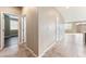 Hallway featuring tile flooring and leads to other rooms in the house at 5648 Alitak Bay St, North Las Vegas, NV 89081