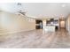 Spacious living room with tile floors, ceiling fan and neutral wall color at 5648 Alitak Bay St, North Las Vegas, NV 89081