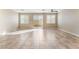 Bright living room with tile flooring and sliding doors to backyard at 5648 Alitak Bay St, North Las Vegas, NV 89081