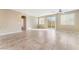 Open floor plan featuring tile flooring and sliding glass door at 5648 Alitak Bay St, North Las Vegas, NV 89081