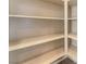 Walk-in pantry provides ample storage space with built-in shelving at 5648 Alitak Bay St, North Las Vegas, NV 89081