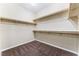 Spacious walk-in closet with multiple levels of shelving and ample storage space at 5648 Alitak Bay St, North Las Vegas, NV 89081