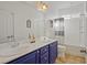 Bathroom features a large vanity with dual sinks and a shower-tub combo at 6121 Sinatra Sands Ct, Las Vegas, NV 89130