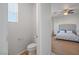 Ensuite bathroom features a toilet and access to the main bedroom at 6121 Sinatra Sands Ct, Las Vegas, NV 89130