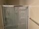 Bathroom featuring glass shower doors and chrome shower head fixture at 7200 Pirates Cove Rd # 1025, Las Vegas, NV 89145