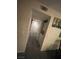 Hallway with carpet, closet and stacked washer and dryer at 7200 Pirates Cove Rd # 1025, Las Vegas, NV 89145