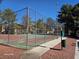 Well-kept community tennis court, fenced for privacy, provides an opportunity for active recreation at 7200 Pirates Cove Rd # 1025, Las Vegas, NV 89145