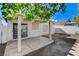 A back patio area with a covered space perfect for outdoor lounging and entertaining at 7836 Lovely Pine Pl, Las Vegas, NV 89143