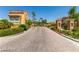 Paver entrance to the gated community with desert landscaping at 820 Canterra St # 1054, Las Vegas, NV 89138