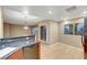 Bright kitchen featuring granite countertop, stainless steel appliances, and breakfast bar at 820 Canterra St # 1054, Las Vegas, NV 89138