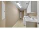 Functional laundry room with washer, dryer, and ample storage space at 820 Canterra St # 1054, Las Vegas, NV 89138
