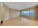Spacious living area with large windows providing ample natural light at 820 Canterra St # 1054, Las Vegas, NV 89138