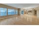 Bright living room with hardwood floors and large windows overlooking the yard at 820 Canterra St # 1054, Las Vegas, NV 89138