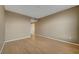 Neutral living room with bamboo flooring and neutral paint at 820 Canterra St # 1054, Las Vegas, NV 89138