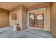 A patio featuring a sliding glass door, a window, and an outdoor seating area at 820 Canterra St # 1054, Las Vegas, NV 89138