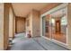 View of outdoor covered patio and sliding glass door entry at 820 Canterra St # 1054, Las Vegas, NV 89138