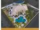 Expansive aerial view of the property showcasing the pool, landscaping, and three-car garage at 8211 Windsor Crest Ct, Las Vegas, NV 89123