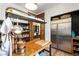 Cozy kitchen area with butcher block island, stainless steel appliances, and pantry storage at 8211 Windsor Crest Ct, Las Vegas, NV 89123