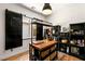 Functional kitchen prep area with butcher block island, sliding door, and ample storage at 8211 Windsor Crest Ct, Las Vegas, NV 89123