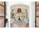 Elegant living room with vaulted ceilings and large windows offering abundant natural light at 8211 Windsor Crest Ct, Las Vegas, NV 89123