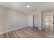 Neutral bedroom featuring a closet, a light, and a door to another room at 8212 Fawn Brook Ct, Las Vegas, NV 89149