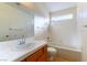 Bright bathroom showcasing a vanity, and a shower-tub combo at 8217 Maplestar Rd, Las Vegas, NV 89128