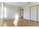 Bedroom with laminate floors and ample closet space plus natural light at 8217 Maplestar Rd, Las Vegas, NV 89128