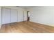 Spacious bedroom featuring wood-look flooring and a large closet at 8217 Maplestar Rd, Las Vegas, NV 89128
