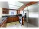 Beautiful kitchen boasts stainless steel appliances, granite countertops, and ample cabinet space at 8217 Maplestar Rd, Las Vegas, NV 89128
