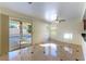 Bright living space with sliding glass doors leading to the backyard pool area at 8217 Maplestar Rd, Las Vegas, NV 89128
