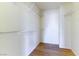 Walk-in closet with laminate floors and wire shelving for ample storage space at 8217 Maplestar Rd, Las Vegas, NV 89128
