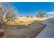 Backyard featuring a block wall and some patio space at 8728 Honey Vine Ave, Las Vegas, NV 89143