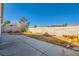 Backyard featuring a concrete patio and a block wall at 8728 Honey Vine Ave, Las Vegas, NV 89143