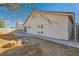 Backyard featuring a pair of french doors, block wall and dry landscaping at 8728 Honey Vine Ave, Las Vegas, NV 89143