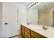 Bathroom featuring double sinks and a shower-tub combo at 8728 Honey Vine Ave, Las Vegas, NV 89143