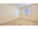 The bedroom has carpet floors, a window, and a sliding-door closet at 8728 Honey Vine Ave, Las Vegas, NV 89143