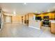 Spacious open floor plan connecting the living area and kitchen, perfect for entertaining and Gathering gatherings at 8728 Honey Vine Ave, Las Vegas, NV 89143