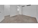 Bedroom with neutral walls, carpet, and a view into the hallway at 108 Fiery Hill Ave, Henderson, NV 89011